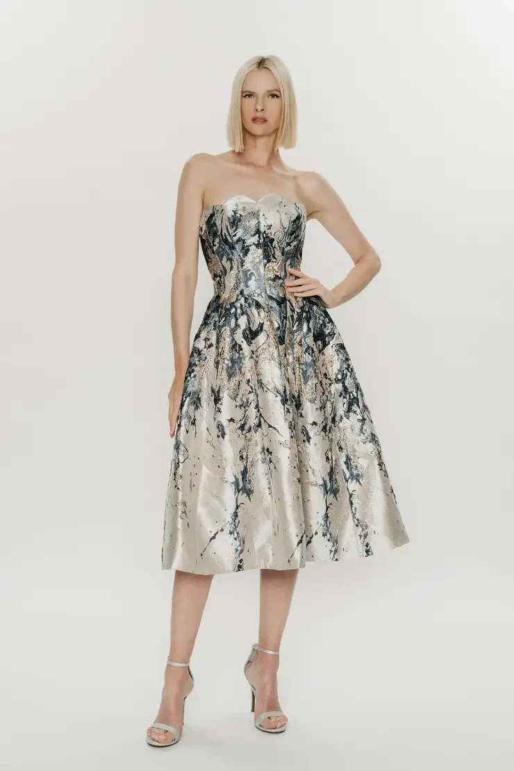 Model wearing short black Hynes Park gown