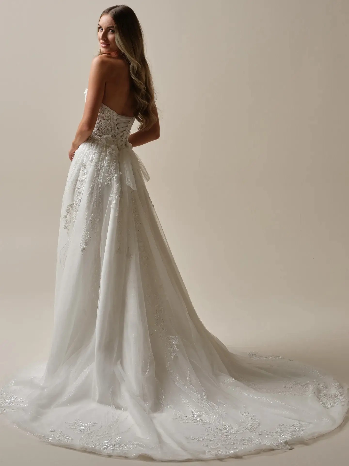 Strapless A-line wedding dress by Maggie Sottero, organza bridal gown