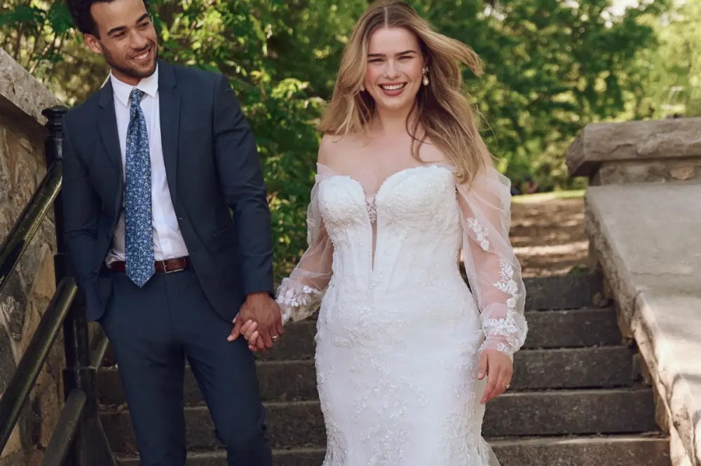 Plus size model wearing a white bridal gown